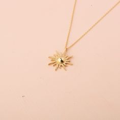 Our 14K Solid Gold Sunburst Necklace is a luxurious and elegant piece, perfect for adding a touch of radiance to your style. The necklace features a meticulously handcrafted sunburst pendant, sized 17mm by 17mm, symbolizing warmth, energy, and vitality. Whether you choose the classic elegance of Gold, the soft allure of Rose Gold, or the pristine sophistication of White Gold, this necklace is a versatile addition to any jewelry collection. Crafted from high-quality 14K solid gold, it is not only Elegant Sunburst Jewelry With Sun And Moon Design, Elegant Sunburst Jewelry With Sun Design, Elegant Gold Starburst Necklace, Elegant Sunburst Jewelry Gift, Elegant Sun And Moon Design Sunburst Jewelry, Sterling Silver Necklace With Yellow Gold Sun Design, Elegant Round Pendant Jewelry With Sun Design, Elegant Round Sun Design Pendant Jewelry, Elegant Round Pendant With Sun Design