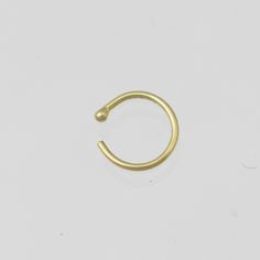 Handcrafted nose hoops in your choice of 14k yellow gold, rose gold, or white gold. (Solid Gold, not plated or filled). Hoop has a ball on one end to help secure in place. Measures about 9mm in diameter. 20 gauge Can be made with any gauge and diameter, feel free to request a price quote! Nose Rings Studs, Gold Nose Ring, Hawaiian Pattern, Family Rings, Gold Nose Rings, Mother Rings, Nose Hoop, Nose Rings, Nose Ring Stud