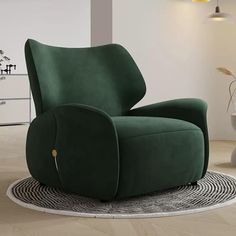 a green recliner chair sitting on top of a white rug in a living room