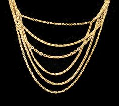 Sophisticated vintage gold tone multi strand chain necklace. It is 19 inch necklace with spring ring clasp. Fashionable for any occasion, formal to casual wear. DETAILS: ☼ Approximately 19 inches. ☼ Approximately 30 grams total weight. ☼ ☼ ☼ ☼ ☼ ☼ ☼ ☼ ☼ ☼ ☼ ☼ ☼ ☼ ☼ ☼ ☼ ☼ ☼ ☼ ☼ PLEASE NOTE: ☼ Different items on SALE everyday! Check back often to take advantage of these bargains! ☼ FREE DOMESTIC SHIPPING on purchases of $35 or more. Combined shipping is still available to domestic and internationa Multi-strand Figaro Chain Necklace, Formal Multi-strand Delicate Chain Necklace, Formal Gold Multi-strand Layered Necklace, Palm Coast, Multi Strand Necklace, Multi Strand, Spring Rings, Vintage Gold, Casual Wear