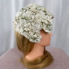 "Vintage sweet white flower Fascinator hat. A beautiful addition to your costume, or a smart accessory for a lovely social event! Perfect for Christmas, New Year's Eve, or Valentine's day. Attach with hair pins or glue a comb in, as it has no attachment for the hair. Vintage sale item, sold as is. All of my vintage items show some wear and age. I bought them worn and loved and wore them with love. Mannequin head is smaller than the average head. My head is approx 22.5\", and this fits me ok.  NE Vintage White Fascinator For Evening, Vintage White Evening Fascinator, Vintage White Fascinator Hat, White Vintage Fascinator Hat, White Vintage Cloche Fascinator, Vintage White Hat Headpiece, Vintage White Cloche Fascinator, White Hat For Vintage Events, Vintage White Mini Hats For Evening