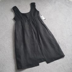 Grace Elements Brand Pure Black Size 4 Zipper On Side 2 Layers, Shell 100% Linen And Lining 100% Cotton Machine Washable Brand New-Never Worn Measurements: Pit To Pit 17.5" Length 40.5" Black Sleeveless Linen Dress Casual, Casual Black Sleeveless Linen Dress, Casual Black Linen Midi Dress, Sleeveless Black Linen Dress For Spring, Black Sleeveless Linen Dress For Spring, Black Sleeveless Linen Dress For Summer, Black Linen Summer Dress For Daywear, Black A-line Linen Summer Dress, Chic Black Sleeveless Linen Dress