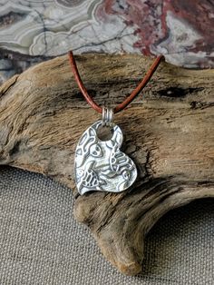 "You can find more silver treasures in my shop! Click here: https://www.etsy.com/shop/SeasideSilverJewels Or follow me on Facebook: https://www.facebook.com/SeasideSilverJewels/ This piece brings to mind the Sea Turtle hatchlings when they have to run to the ocean as fast as they can! Look for my matching earrings! https://www.etsy.com/listing/728219152 SIZE AND DETAIL: It's about 1\" long and 1\" wide. Each pendant contains approximately 4.3 grams of fine silver. (I handcraft each piece so weig Artisan Silver Heart Pendant Necklace, Artisan Silver Necklace With Heart Charm, Bohemian Sterling Silver Heart Necklace, Silver Bohemian Heart Necklace Gift, Bohemian Heart Jewelry For Everyday, Silver Bohemian Heart Necklace As Gift, Unique Silver Heart Charm Necklace, Silver Heart Necklace With Hand Stamped Details, Unique Silver Heart Necklace With Charm