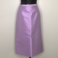 Michael Kors Iridescent Purple Wool/Silk Pencil Skirt Beautiful Condition. New With Tags. Made In Italy. Crafted In 50% Wool / 50% Silk Size 14* ~ 16.25" Waist X 21" Hips X 28.75" Length Elegant Purple Satin Bottoms, Purple Satin Skirt For Party, Purple Satin Party Skirt, Elegant Evening Pencil Skirt For Spring, Formal Silk Midi Pencil Skirt, Spring Formal Satin Skirt, Pink Silk Full Skirt, Formal Pink Silk Skirt, Elegant Pink Silk Bottoms