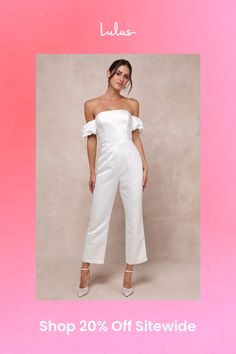 Any bride-to-be is guaranteed to start a trend with a voguish look like the Lulus Chic Vow White Satin Off-the-Shoulder Bow Jumpsuit! Sturdy woven satin shapes this stunning jumpsuit that starts with a princess-seamed bodice with supportive side boning, a sleek off-the-shoulder neckline (with hidden no-slip strips), and short puff sleeves with elastic at the shoulders and cuffs. The high, fitted waist tops slim-fitting, straight pant legs that finish at ankle-length hems. A dramatic, oversized b Strapless Off-shoulder Jumpsuit For Spring Formal, Formal Spring Strapless Off-shoulder Jumpsuit, White Off-shoulder Evening Jumpsuits And Rompers, Formal Spring Strapless Jumpsuit, White Off-shoulder Jumpsuits And Rompers For Evening, Elegant Off-shoulder Strapless Jumpsuit For Spring, Spring Formal Strapless Jumpsuit, Elegant White Strapless Jumpsuit For Summer, Chic Strapless Jumpsuit For Spring Formal