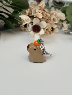 This is my handmade polymer clay keychain! It is dedicated to and inspired by my fiancé who loves capybaras.  Due to its handmade quality, please note that each product will slightly vary in characteristics so it may not match the photo exactly as pictured but they are each made with love and care. I also weigh out my products to maintain as much consistency as possible!  Products used: I used polymer clay to create this keychain. For the details, I used acrylic paint. Finally, I coated the product with UV resin to make it last as long as possible.  Note: I do not accept returns or exchanges and I am not responsible for any damages or losses once your item has been shipped.  Please do not hesitate to reach out to me for any concerns or questions!  Thank you for your support! ⭐️ Matching Clay Keychains, Capybara Keychain, Polymer Clay Keychains, Clay Keychain, Clay Making, Matching Keychains, Craft Day, Uv Resin, Clay Projects