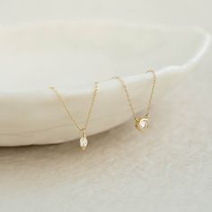 Featuring a marquise diamond drop on a 14k yellow gold chain, the Aletta Necklace is an elegant and understated piece for any occasion.


Lab grown marquise diamond size: 2.2mm x 4.2mm

Total carat weight: 0.08 

14k yellow gold  

Necklace can be worn at 16”, 17”, and 18” Dainty Marquise Yellow Gold Diamond Necklace, Gold Marquise Solitaire Necklace For Formal Occasions, Gold Marquise Solitaire Necklace, Formal Gold Marquise Solitaire Necklace, Gold Marquise Solitaire Necklace For Wedding, Gold Marquise Cut Diamond Necklace, Gold Diamond Necklace With Marquise Cut, Gold Necklace With Single Marquise Cut Diamond, 14k Gold Marquise Diamond Necklace With Single Diamond