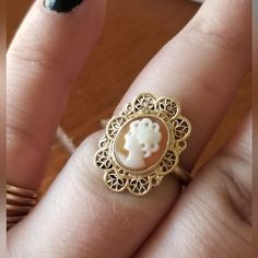 Vintage 10k Gold "Lady W/ Rollers" Cameo Ring Metal- Solid Gold Color Gold- Yellow Gold Stone- Shell Approx. Band Size- 6 1/4 Stamped/Makers Markings- 10k Pscoi (See Photos) Approx. Weight- 2.89grams Condition- Used/Vintage Has Regular Wear As It Is A Vintage Ring Price Is Firm Cameo Rings, Stamp Maker, Cameo Ring, Gold Stone, Ring Metal, Vintage Ring, Solid Metal, Gold Yellow, 10k Gold