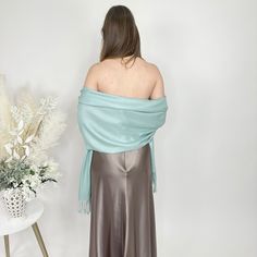 A white pashmina scarf is versatile and will go with any bridesmaid dress and match any wedding theme. Its simply a classic and a must for winter and chilly outdoor weddings! Our wedding pashminas are extremely soft and will keep your guests warm at your wedding reception and they are great pashmina wedding favors for your guests as they are high quality. A prefect bridesmaid proposal gift is a white bridesmaid pashmina! A pashmina scarf is also a great favor gift for guests at a bridal shower, Elegant Winter Wrap Scarf, Winter Wedding Pashmina Shawl, Formal Pashmina Shawl For Winter, Elegant Pashmina Shawl For Fall, Elegant Winter Wedding Pashmina Shawl, Elegant Fall Pashmina Shawl, Elegant Solid Color Winter Scarves, Elegant Winter Pashmina Shawl, Elegant Formal Pashmina Scarves