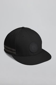 Designed in the New Era 9FIFTY low profile silhouette and featuring our signature double-stripe reflective details for added visibility in low light. An adjustable snapback strap gives a comfortable fit and a tonal black Silicone Arctic Disc logo finishes this style. Canada Goose Logo, Profile Silhouette, Black Hood, Low Light, Snapback Cap, Low Lights, Low Profile, New Era, Black Silver