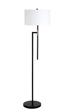 a floor lamp with a white shade on the top and a black base, against a white background