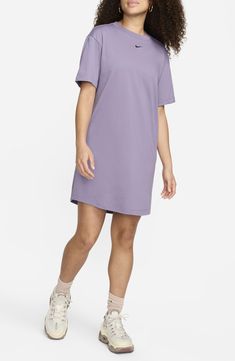 Take your athleisure game to the next level with a soft cotton jersey dress that feels like your favorite Nike T-shirt in a comfortably oversized fit. 34 1/2" length (size Medium) Crewneck Short sleeves Unlined 100% cotton Machine wash, tumble dry Imported Casual Cotton T-shirt Dress With Relaxed Fit, Nike Cotton T-shirt For Loungewear, Casual Solid Color T-shirt Dress For Loungewear, Oversized Casual T-shirt For Daywear, Oversized Nike Cotton T-shirt, Relaxed Fit Crew Neck T-shirt Dress For Spring, Casual Cotton T-shirt Dress For Spring, Oversized Cotton Sweatshirt Dress, Nike Casual Solid Color T-shirt