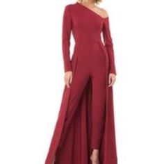 Arya Asymmetric Neck Walk-Thru Jumpsuit - Red Size 8 (Altered To 6/7). Worn As A Mother Of The Bride Dress. Added Jeweled Belt ($80.00- Stitched On) On Waistband. One Wearing. Dry Ckeaned. Fitted Red Pantsuit For Evening, Asymmetrical Fitted Jumpsuit For Evening, Asymmetrical Jumpsuits And Rompers For Evening, Red Long Sleeve Formal Jumpsuit, Red Long Sleeve Formal Jumpsuit And Romper, Formal Red Long Sleeve Jumpsuits And Rompers, Sleek Jumpsuit, Crepe Jumpsuit, Maxi Romper