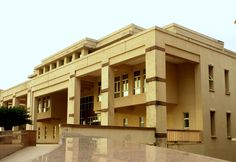 a large building with many windows and balconies