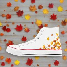 The "Aki" high top canvas shoes are a stunning and stylish choice for those who want to embrace the beauty of autumn and Japanese culture in their footwear. Inspired by the vibrant hues of fall, these shoes feature a design that captures the essence of Japan's iconic autumn foliage. The canvas material is adorned with patterns of maple leaves and branches, creating a warm and eye-catching look. The lace-up closure and padded ankle support ensure comfort and security, while the high top design pr White High-top Sneakers For Fall, Fall Season Low-top Canvas Shoes, White Fall Sneakers With Rubber Sole, Custom White High-top Cotton Sneakers, White Sneakers With Rubber Sole For Fall, White Mid-top Sneakers For Fall, Shoes For Him, Fall Converse, Women High Top Sneakers