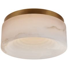 a white and gold ceiling light with a circular glass shade on the top of it