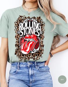 Embrace your inner rocker with our Wild Rocker Vintage Vibes Leopard Tee! This edgy tee combines classic vintage style with a touch of wildness. The bold leopard print design adds a fierce edge, while the relaxed fit ensures comfort. Perfect for pairing with jeans or leggings, this tee is a must-have for music lovers and trendsetters alike. Stand out from the crowd and rock your unique style with this statement tee! - Vintage-inspired leopard print design - Comfortable and stylish fit - Perfect for casual wear or layering - Available in a range of sizes for all body types *Unisex Sizing* - Brand is Comfort Colors Terms and Conditions: Returns, Exchanges and Refunds are honored within the first 30 days of purchase. Shipping Times: please expect 4-7 days to receive your items from the date o Trendy Leopard Print Graphic T-shirt, Rock Style Graphic T-shirt For Fall, Rock Style Graphic Print T-shirt For Fall, Fall Rock And Roll Style T-shirt With Graphic Print, Fall Leopard Print Graphic T-shirt, Relaxed Fit Leopard Print Graphic T-shirt, Classic Vintage Style, Statement Tees, Vintage Vibes