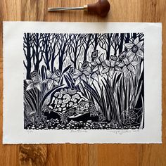 an ink drawing of a frog in the woods