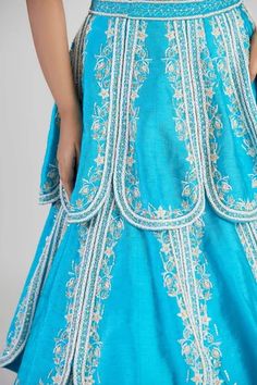 Shop for Megha Bansal Blue Raw Silk Faiza Hand Embroidered Petal Lehenga And Blouse Set for Women Online at Aza Fashions Traditional Embroidered Cutdana Wedding Dress, Traditional Wedding Embroidered Dress With Cutdana, Traditional Embroidered Wedding Dress With Cutdana, Semi-stitched Embellished Embroidered Dress For Festivals, Embellished Semi-stitched Embroidered Dress For Festivals, Embroidered Dress For Diwali Reception With Intricate Embroidery, Bollywood Embroidered Dress For Diwali Reception, Intricate Embroidered Dress For Diwali Reception, Bollywood Style Embroidered Dress For Diwali Reception