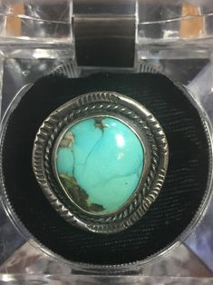 "Pretty turquoise ring in a scored sterling silver setting. This vintage ring is in \"as found\" condition; we have not tried to polish. The setting is sterling silver but is unmarked. We like the scored flange setting and the marbling of the turquoise. The ring size is 5 and the ring \"face\" measures 1\" x 1\". Please review the photographs to see the condition details up close. Free shipping applies to US customers only. This item will be shipped via USPS mail. International customers should contact us, prior to purchase, to obtain shipping availability and associated fees.  Our goal is to have your experience with us be a positive one. Therefore it is important to us that you get a clear understanding of what you are considering before you purchase. All of our pieces are well-loved and The Ring Face, Marbling, Vintage Ring, Vintage Rings, Turquoise Ring, Turquoise Necklace, Jewelry Rings, Ring Size, How To Apply