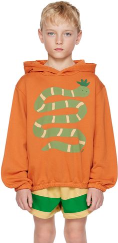 Garment-dyed GOTS-certified organic cotton French terry hoodie. · Graphic printed at front · Elasticized hem and cuffs · Logo flag at side seam · Machine-wash Supplier color: Brown Model measures 48” / 121.9 cm tall and wears size 8. TINYCOTTONS Size: child's height 2: 36 / 92 cm 3: 38.5 / 98 cm 4: 41 / 104 cm 6: 45.5 / 116 cm 8: 50.5 / 128 cm 10: 55 / 140 cm 12: 60 / 152 cm Snake Hoodie, Kidswear Trends, Hoodie Graphic, French Terry Hoodie, Tiny Cottons, Organic Clothing, Kids Sweatshirt, The Happy, Kids Design