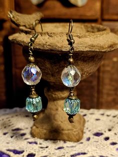 Romantic Victorian Iridescent Aquamarine drop earrings with beautiful multifaceted Opalescent Globe and antiqued bronze findings. Beautiful,  unique, and captivating premium Czech glass beads. The earwires are lead and nickle free, hypoallergenic.  Gift wrapping Available and Special orders Welcome.  Please stop by my Etsy shop to see over 500 personally designed and handcrafted hair accessories and Jewelry items. Vintage Nickel-free Drop Beaded Earrings, Nickel-free Vintage Drop Beaded Earrings, Glass Faceted Beads Earrings For Gift, Glass Earrings With Faceted Beads For Gift, Glass Earrings With Faceted Beads As A Gift, Vintage Beaded Earrings With Dangling Beads, Vintage Crystal Drop Earrings For Jewelry Making, Vintage Czech Glass Beaded Earrings As Gift, Vintage Nickel-free Beaded Earrings With Round Beads