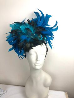 Peacock feathers Fascinator- Polo Classic- bird headpiece- peacock headband -wedding -Derby- Ascot -Melbourne Cup- Mad hatter Hello, This is a show stopper and people who have bought it come back or text me with pictures. Pete is a feather peacock bird that's sitting on a straw circle base and has turquoise coque feathers. The glitter and sparkle peacock is on top of the head. The whole piece is on a 1/8 inch headband that is covered with satin ribbon. It's adjustable and very comfortable. It's Ostrich Feather Headpiece For Kentucky Derby Party, Ostrich Feather Headpieces For Kentucky Derby Party, Kentucky Derby Ostrich Feather Headpiece For Party, Gatsby Style Feather Fascinator For Party, Gatsby Style Party Fascinator With Feathers, Feathered Evening Hat For Carnival, Carnival Party Fascinator With Feather Trim, Gatsby Style Feather Headband, Carnival Mini Hats With Feathers For Races