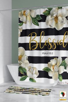 a black and white striped shower curtain with flowers on it that says, besod