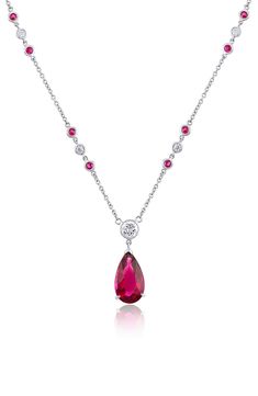 Bezel-set diamonds and rubies line the chain of this platinum necklace showcasing a central rubellite tourmaline pendant. 18" length Lobster clasp closure Total rubellite tourmaline weight: 5.74ct. Total ruby weight: 0.75ct. Total diamond weight: 1.15ct. Platinum/rubellite tourmaline/diamond/ruby Made in the USA >Diamond Guide Classic Necklace With Lab-created Ruby Gemstone, Classic Ruby Necklace With Prong Setting, Classic Style Necklaces With Lab-created Ruby Gemstone, Classic Formal Necklace With Lab-created Ruby, Classic Necklaces With Lab-created Ruby Gemstone, Formal Pear-shaped Ruby Necklace, Classic Necklace With Lab-created Ruby, Luxury Ruby Necklaces With Gemstone Accents, Elegant Necklace With Prong Setting And Lab-created Ruby