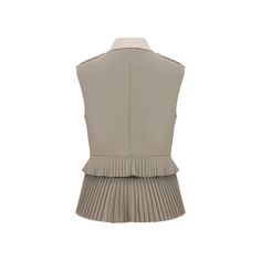 This chic top blends contemporary design with timeless features, making it a versatile addition to any wardrobe. It showcases a sleeveless silhouette with a classic collar and button-down front. A standout feature of this blouse is its detachable pleated peplum hem, secured with a double-sided zipper, offering the flexibility to create multiple stylish looks. 87 %wool; 10 %polyamid; 4% lycra  Professional Dry Clean Only Elegant Beige Sleeveless Vest, Elegant Sleeveless Beige Vest, Chic Workwear Vest Top, Classic Beige Sleeveless Top, Beige Vest For Work, Chic Beige Office Vest, Chic Tailored Beige Vest, Tailored Beige Tops For Work, Chic Tailored Sleeveless Vest