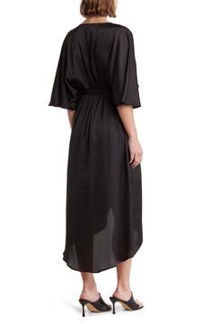 A gracefully draped faux-wrap dress features batwing sleeves and a slit high-low hem for contemporary style. Slips on over head V-neck Three-quarter sleeves Partially lined 100% polyester Hand wash, dry flat Imported Model stats: 5'10" height, 32" bust, 25" waist, 36" hip. Model is wearing size Small. Faux Wrap Dress, Batwing Sleeve, High Low Hem, Bat Wings, Stylish Sneakers, Three Quarter Sleeves, Three Quarter, Contemporary Style, High & Low