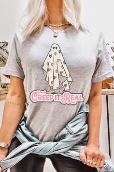 CREEP IT REAL,GHOST,HALLOWEEN UNISEX SHORT SLEEVE,GRAPHIC TEE,GRAPHIC TSHIRTS,TSHIRTS,TEES100%COTTON,HEATHER(52%COTTON,48%POLY),ATH.HEATHER,BLACK HEATHER(90%COTTON,10%POLY)NICARAGUAMade In: Nicaragua Real Ghost, Creep It Real, Real Ghosts, Halloween Graphic Tees, Halloween Graphic, Ghost Halloween, Swimwear Sale, Halloween Ghosts, Unisex Shorts