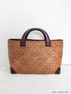 BagForLove - Artisanal Straw Beach Bag: Retro Rattan Weaving, Handmade for Simplicity and Style Product Description Color Brown Pattern Type Colorblock Bag Size Small Type Top Handle Bag Material Straw Size Chart INCH CM Bag Length Bag Width Bag Height Handle Height 11.8 inch 4.3 inch 8.7 inch 2.8 inch Bag Length Bag Width Bag Height Handle Height 30 cm 11 cm 22 cm 7 cm Details Pictures Similar Products h2 { text-align: center; } /* æ¢è¡ */ li{ white-space: normal; word-break: break-all; word- Traditional Shoulder Bag With Bamboo Handle, Brown Open Weave Beach Bag For Everyday Use, Traditional Summer Shoulder Bag With Bamboo Handle, Brown Handheld Beach Bag With Bamboo Handle, Brown Basket Bag With Open Weave, Handheld Brown Beach Bag With Bamboo Handle, Brown Open Weave Tote Beach Bag, Brown Open Weave Shoulder Bag With Double Handle, Brown Basket Beach Bag With Open Weave