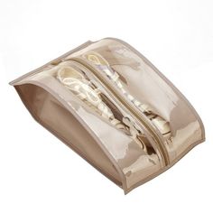 the zippered pouch is open and has two pairs of shoes inside it, on a white background