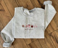 Get ready for the cozy and colorful vibes of fall with our custom fall girl embroidered crewneck! This cute and stylish crewneck features a beautifully embroidered design of the autumn season. Each crewneck is made to order, ensuring that you'll receive a unique and personalized piece that captures the spirit of fall. Whether you're out for a pumpkin spice latte or enjoying a crisp evening by the bonfire, this crewneck is the perfect way to showcase your love for fall. It also makes a thoughtful and one-of-a-kind gift for any fall enthusiast in your life. Embrace the magic of the season with our custom fall girl embroidered crewneck! Colorful Vibes, Fall Crewneck, Fall Girl, Custom Crewneck, Embroidered Crewneck, Embroidered Sweatshirt, Autumn Season, Personalized Birthday Gifts, Pumpkin Spice Latte