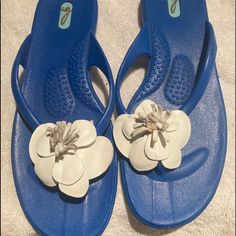 Blue Thong Sandal With White Flower Never Worn Leather Flowers, Thong Sandals, Blue Shoes, White Leather, Women's Shoes Sandals, White Flowers, Shoes Sandals, Blue And White, Sandals