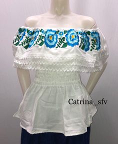 Beautiful and fine white blouse embroidered with silk thread in king blue and sky blue 100% cotton Light Blue Embroidered Summer Blouse, Fitted Light Blue Blouse With Floral Embroidery, White Fitted Top With Machine Embroidery, Fitted White Tops With Machine Embroidery, Fitted White Top With Machine Embroidery, Traditional Blue Summer Shirt, Blue Floral Embroidered Summer Blouse, Blue Floral Embroidery Blouse For Summer, Traditional Blue Shirt For Summer