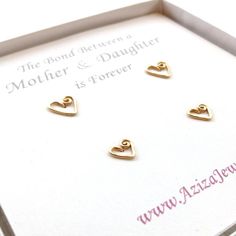 Mother Daughter heart earrings set.14k Gold heart studs- one for mom and one for daughter. Perfect gift for a new mom or as a push present. Select 14k solid gold for sensitive new born ears or if you require minimal care for your jewelry that will last a lifetime or wish to wear it in the shower or pool.Join my mailing list to find out about sales and new collections: http://eepurl.com/gLcTn Dainty Earrings For Anniversary And Mother's Day, Dainty Earrings For Anniversary On Mother's Day, Dainty Earrings For Mother's Day, 14k Gold Earrings For Anniversary And Mother's Day, Yellow Gold Earrings For Mother's Day, Mother's Day Gift Earrings With Heart Charm, Sterling Silver Earrings For Anniversary And Mother's Day, Sterling Silver Earrings For Mother's Day Anniversary, Gold Heart Earrings For Mother's Day