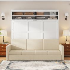 a living room filled with furniture and lots of storage on top of the wall above it