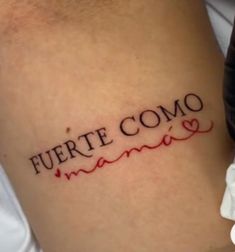 a tattoo that reads fuerte comoo