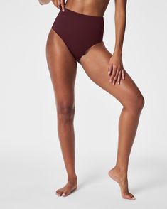 We took everything we know about shapewear to design flattering swimsuits with 360 degrees of shaping. Our ultra high-rise style offers modest cheeky coverage with stay-put edges. In a subtly textured pique fabric. | Spanx Women's SPANXshape Swim Pique Ultra Hi-Rise Cheeky Bottom High Stretch Full Coverage Swimwear For Summer, Shapewear Swimwear With Seamless Construction, Seamless Shaping High-cut Leg Swimwear, Modern Compressive Swimwear In Solid Color, Modern Compressive Solid Color Swimwear, Modern Solid Color Compressive Swimwear, High Waist Seamless Stretch Swimwear, Modern Compressive Seamless Swimwear, Modern Stretch Smoothing Swimwear