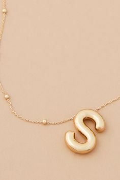 The 18K Gold Monogram Necklace gives any outfit a personal touch! With a dainty chain and initial, this will become your go-to accessory! The perfect layering piece, this necklace makes the perfect gift for friends and family. Trendy Initial Pendant Necklace With Delicate Chain, Trendy Initial Pendant Necklace With Clavicle Chain, Gold Monogram Necklace In Trendy Style, Trendy Gold Monogram Necklace, Gold Trendy Initial Necklace, Trendy Gold Initial Necklace, Trendy Gold Initial Necklace With Clavicle Chain, Intial Necklace, Gold Monogram Necklace