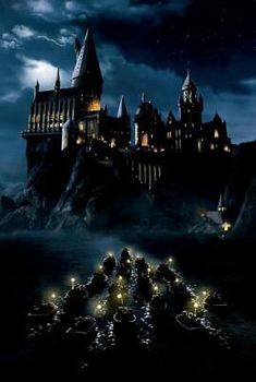 the hogwarts castle is lit up at night