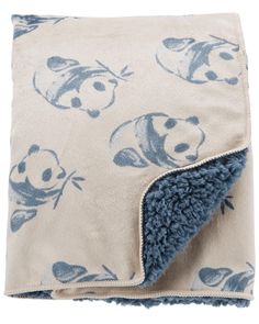 a blanket with panda bears on it