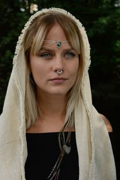 The Silver Head Chain features a drop-shaped gemstone with round balls on the lower edge. Worn draped over the crown of the head or as a Necklace. The Labradorite centrepiece is decorated with 3 chains draped on each side. This piece of jewelry work well dressed up or worn casually. This timeless design is perfect for festivals, weddings & any day that needs some extra sparkle! Size Guide: Adjustable size with a lobster clasp on the backside Material: Brass (nickel free) Stone: Drop-shaped L Mystical Jewelry For Meditation, Adjustable Bohemian Sterling Silver Body Jewelry, Bohemian Adjustable Jewelry With Silver Beads, Handmade Silver Body Jewelry, Handmade Silver Body Jewelry For Festivals, Spiritual Sterling Silver Jewelry For Festival, Bohemian Body Jewelry For Wedding, Bohemian Sterling Silver Body Jewelry, Handmade Silver Jewelry With Teardrop Crown