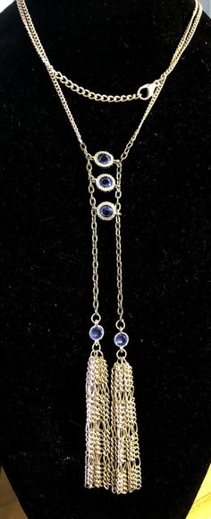 * Estate Silver Tone Round Blue Faceted Glass Bohemian Style Statement Necklace * Chain length: 28-1/2" including 2" extender * Chain width:1/8" * Pendant length: 7-1/4" * Pendant width: 2-1/8" * Three round glass beads measure approximately 7.75 mm each * Two round glass beads measure approximately 5.25 mm each * Necklace weight: 27.6 tgw * Unmarked * Clasp: Lobster * Condition: As pictured. * C872    Exported By ExportYourStore :) Blue Lariat Jewelry For Party, Blue Dangle Jewelry With Adjustable Chain, Blue Lariat Necklace For Party, Blue Long Necklace With Adjustable Chain, Blue Necklace With Delicate Metal Chain, Blue Lariat Jewelry With Adjustable Chain, Elegant Blue Lariat Necklace With Adjustable Chain, Blue Lariat Necklace With Adjustable Chain, Blue Long Lariat Necklace With Adjustable Chain