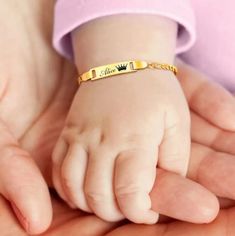 Discover the perfect keepsake with our Customized Name Bracelets for Infants, a thoughtful and enduring gift that celebrates those special early moments. Meticulously crafted from non-allergenic stainless steel, these baptism bangles are not only safe for sensitive skin but also exude a timeless elegance. Key Features: Metals Type: High-quality Stainless Steel, known for its durability and hypoallergenic properties. Length: Adjustable from 12 to 15 cm, ensuring a comfortable and secure fit as your child grows. Personalization: Customize with your child's name, making it a unique and cherished item. Ideal for Special Occasions: Perfect for baptisms, birthdays, or as a family love gift, this bracelet serves as a beautiful symbol of affection and memory. Jewelry Care Instructions: To maintain Adjustable Nameplate Gold Bracelet For Birthday, Adjustable Gold Nameplate Bracelet For Birthday, Personalized Adjustable Gold Bracelet For Mother's Day, Adjustable Personalized Gold Bracelet For Wedding, Personalized Adjustable Gold Bracelet For Wedding, Classic Personalized Birthday Bracelets, Classic Engraved Bracelets For Birthday, Gold Name Bracelet For Father's Day Gift, Classic Adjustable Name Bracelet For Birthday