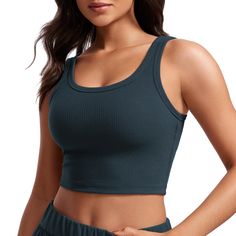 PRICES MAY VARY. Designed for yoga and daily wear. Light support. Lyocell Ribbed textured fabric is soft and smooth, 4-way stretch and premium durable. Built in bra with removable pads for support. U neck and back. Wide straps design. Camisole style for casual and stylish. Slightly thicker ribbed fabric that's breathable, stretchy & moisture-wicking. Light compression and light support. U-shaped neckline for better coverage. Camisole style, suitable for workout and outside wear.
 
 Feature & Fit Solid Athleisure Seamless Tank Top, Comfortable Stretch Activewear With Soft Texture, Solid Color Athleisure Activewear For Loungewear, Athleisure Solid Color Activewear For Loungewear, Seamless Athleisure Activewear For Relaxation, Seamless Athleisure Activewear For Casual Wear, Comfortable Workout Tank Top, Comfortable Solid Tops For Yoga, Solid Color Athleisure Activewear For Gym