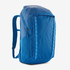 a blue backpack is shown on a white background