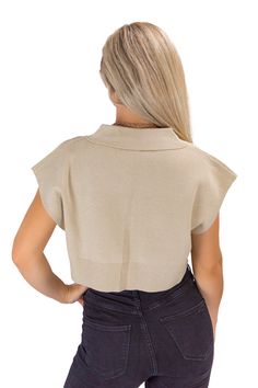 Our cropped sweater is a chic addition to your wardrobe for any occasion. This sweater is made with comfort and style in mind. It offers a regular fit and a trendy cropped length, making it perfect for pairing with high-waisted jeans or skirts. The beige color adds a touch of versatility, allowing you to mix and match with your favorite outfits easily. With a classic polo-neck design and short sleeves, this polo-neck sweater combines timeless elegance with a modern flair. Whether heading to a pa Chic Sweaters, Fashion Now, Polo Neck, Urban Chic, Cropped Sweater, Beige Color, Neck Designs, In Fashion, High Waist Jeans